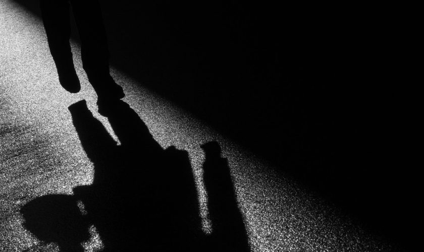 Child in shadow